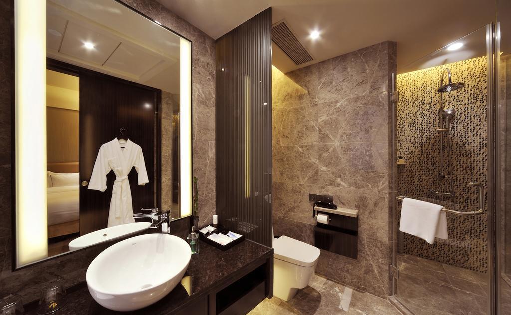 Royal Suites & Towers Ухан Стая снимка